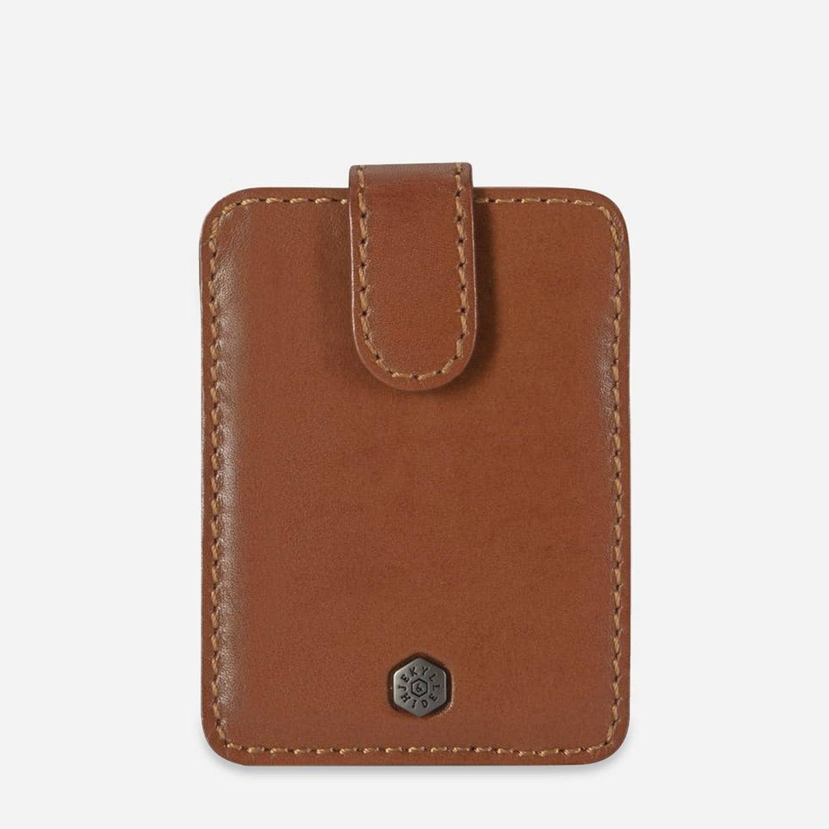 Front of the tan leather Tab Card Holder with press-stud pull tab and hexagonal logo badge
