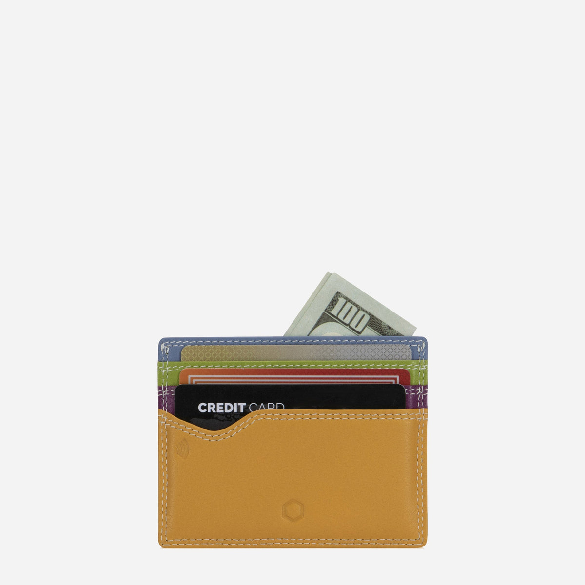 Jekyll & Hide Card Holder in Fiji mustard leather with cards and notes tucked in