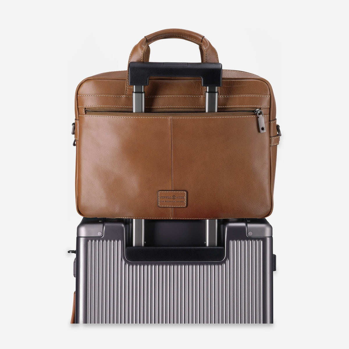 Colt tan leather Laptop Briefcase fitted over a suitcase handle using its rear trolley sleeve