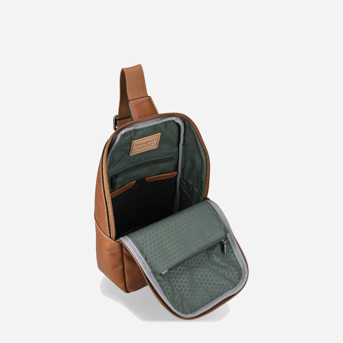 Colt Single Strap Backpack open, showing the sage green lining and organiser pockets