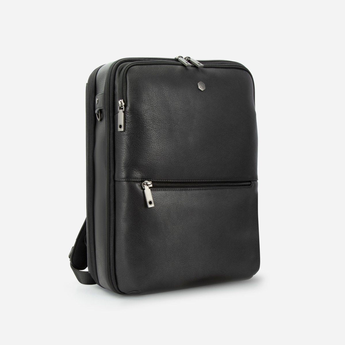 Three-quarter view of the black leather expander backpack with side trolley strap – Jekyll & Hide