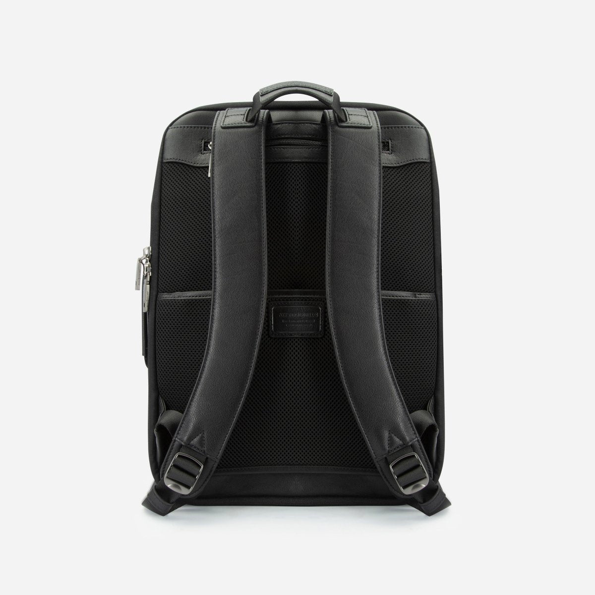 Back view of the black leather expander backpack showing the padded leather and mesh straps – Jekyll & Hide