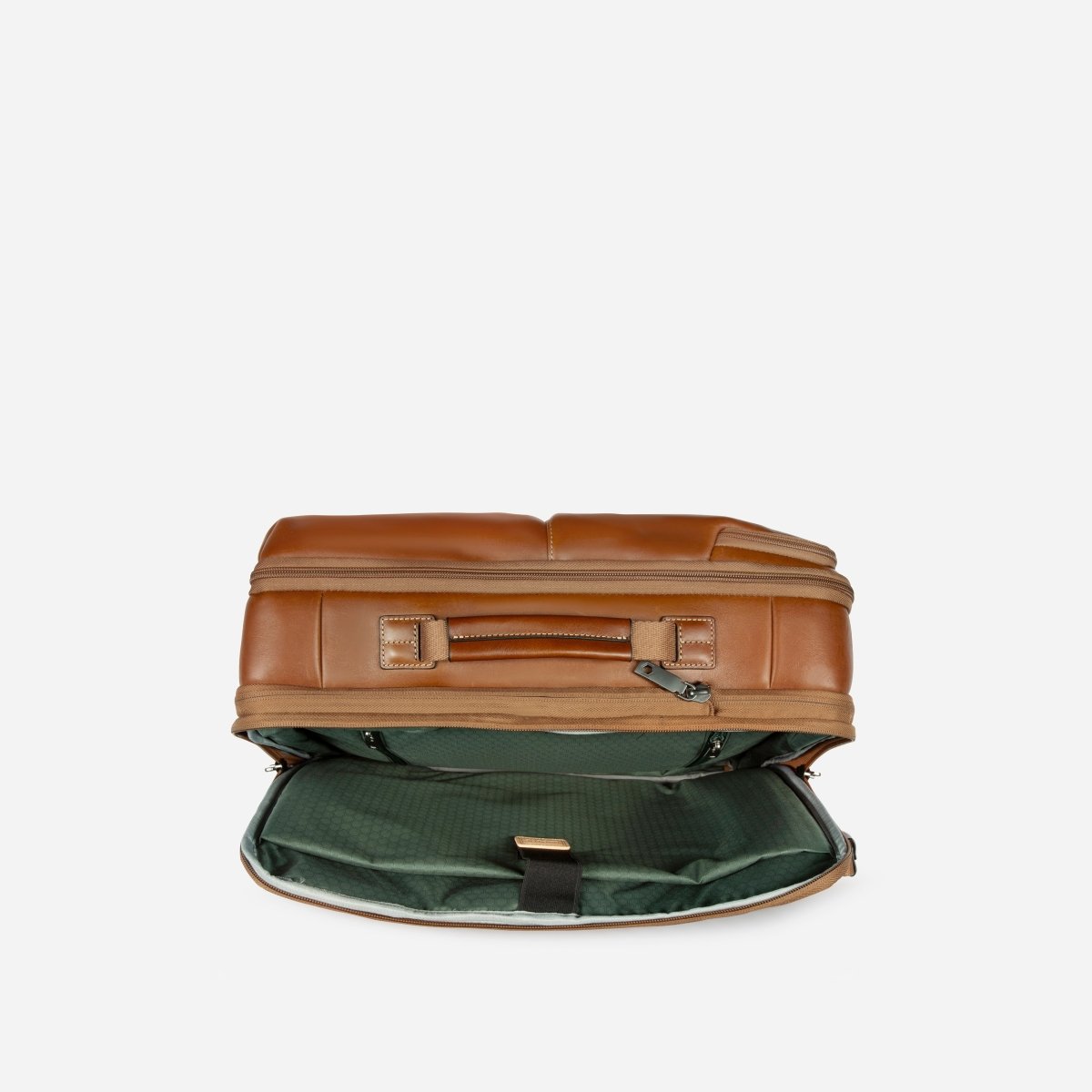 Tan leather backpack with the expander gusset unzipped, showing the green lining – Jekyll & Hide