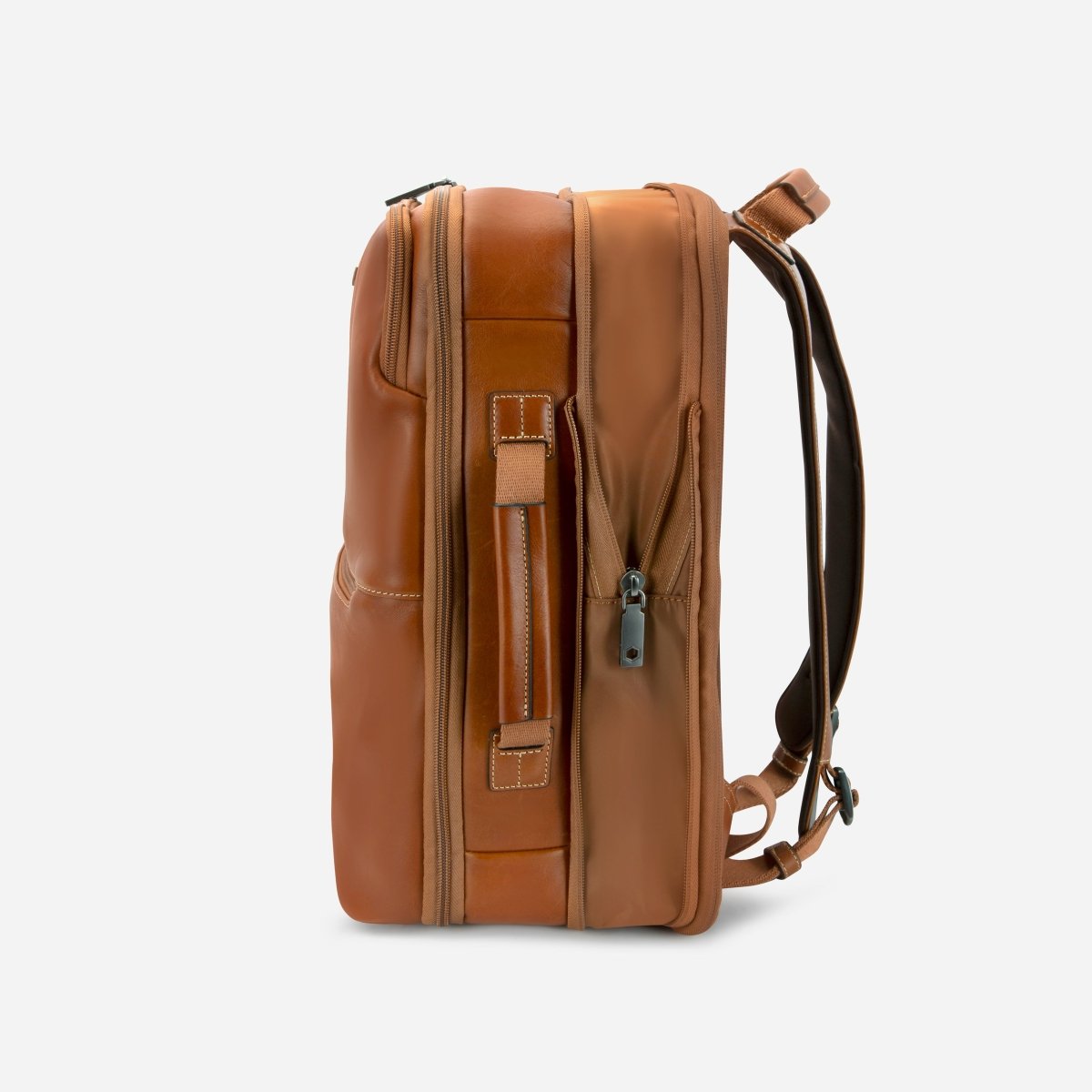 Side profile of the tan leather expander backpack with the side gusset zip – Jekyll & Hide