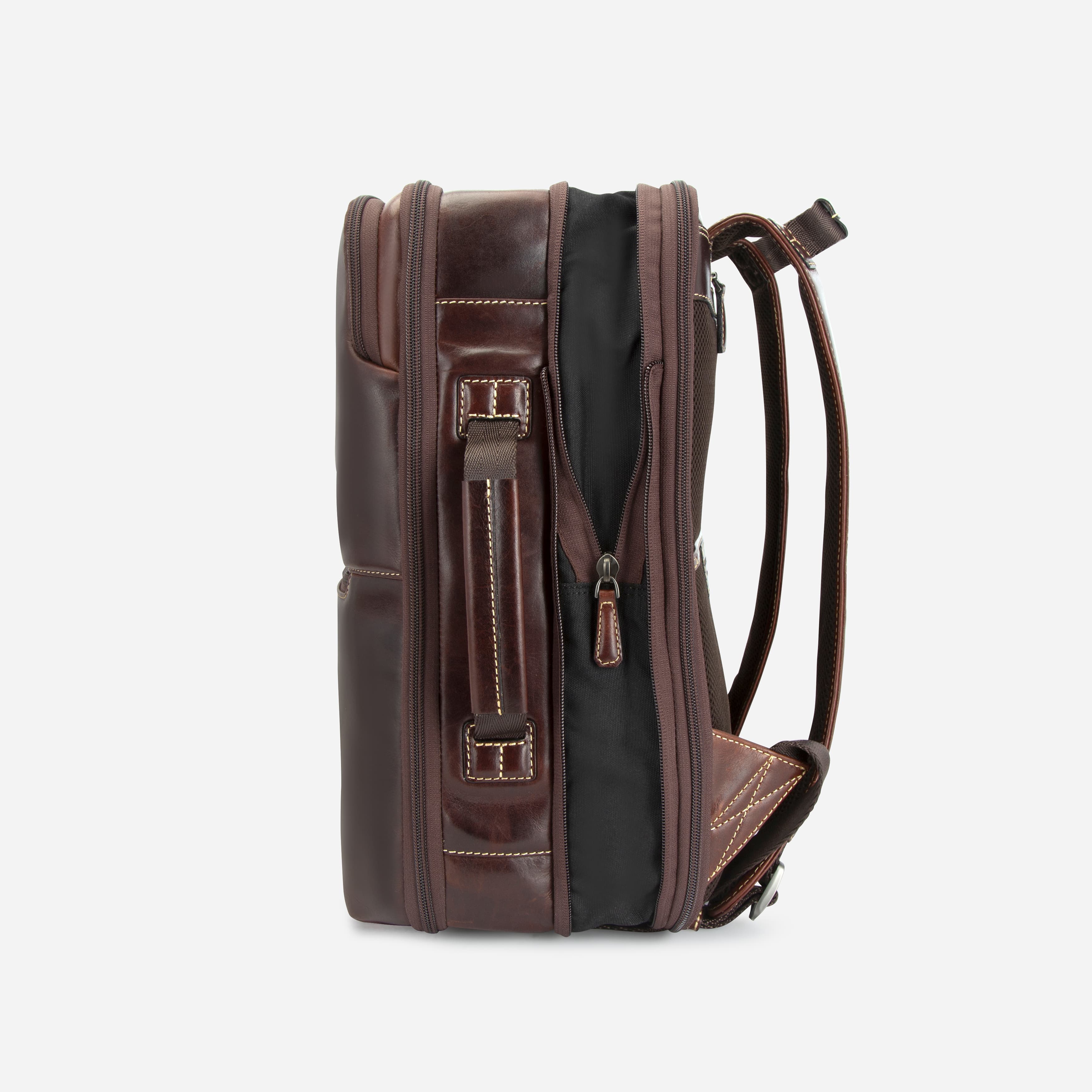 Side profile of mocha leather expander backpack showing expansion zip