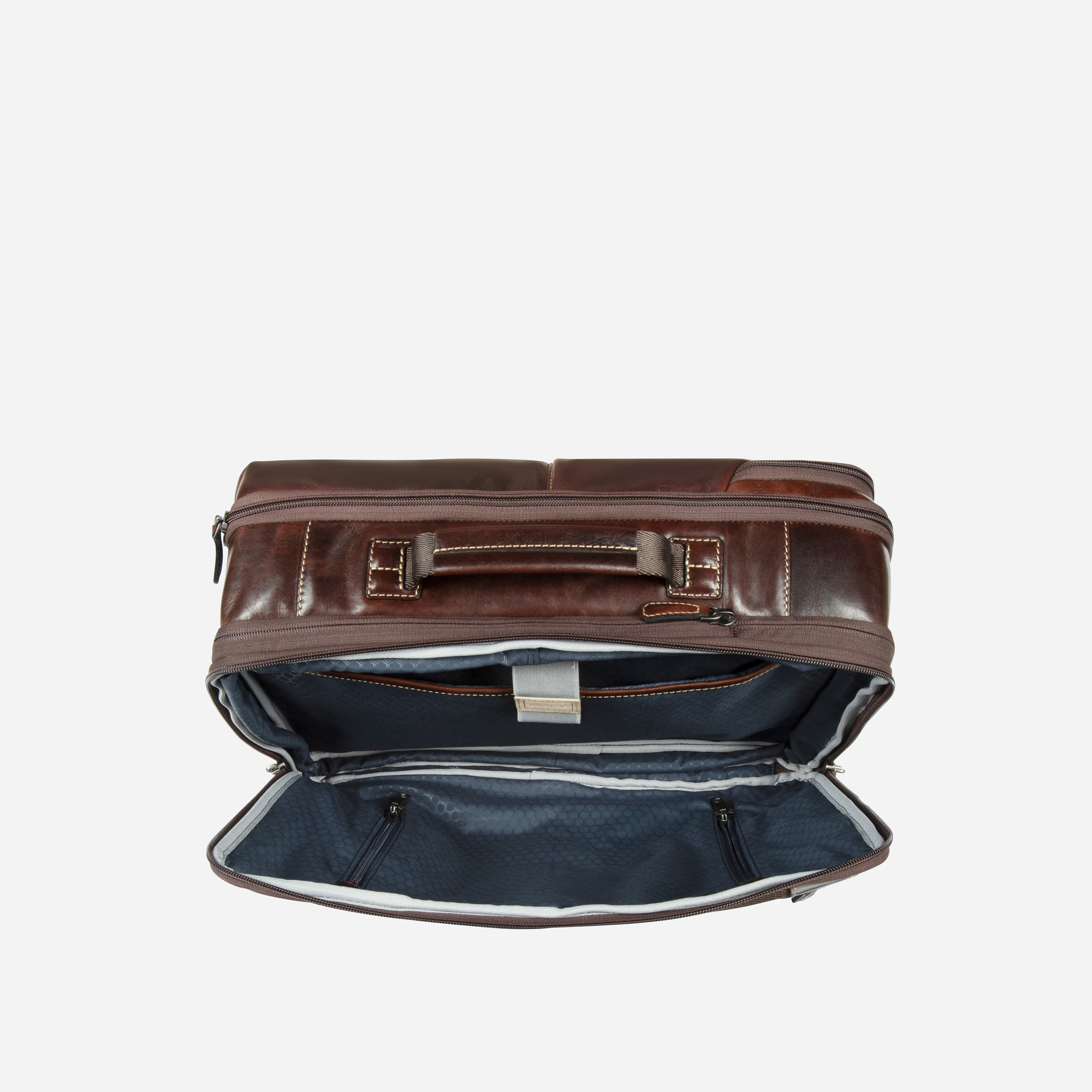 Side view of open mocha leather expander backpack interior