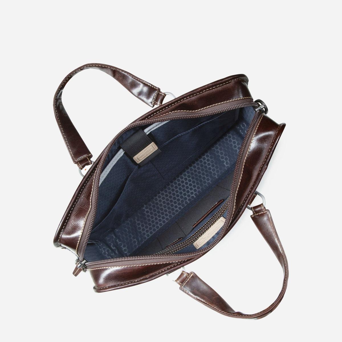 Mocha leather Medium Briefcase open from above, showing the navy patterned lining