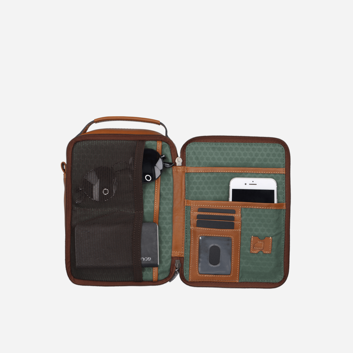 Colt Detailed Crossbody opened flat, holding a phone, cards and tech in green lined pockets