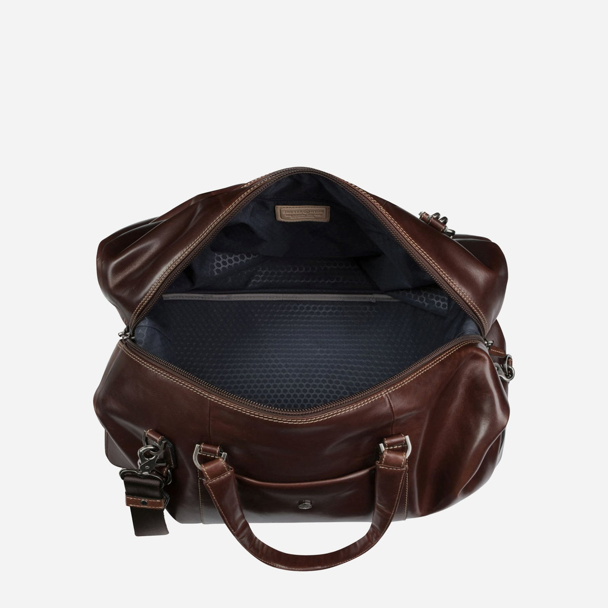 Mocha Weekender open from above, showing the navy patterned lining