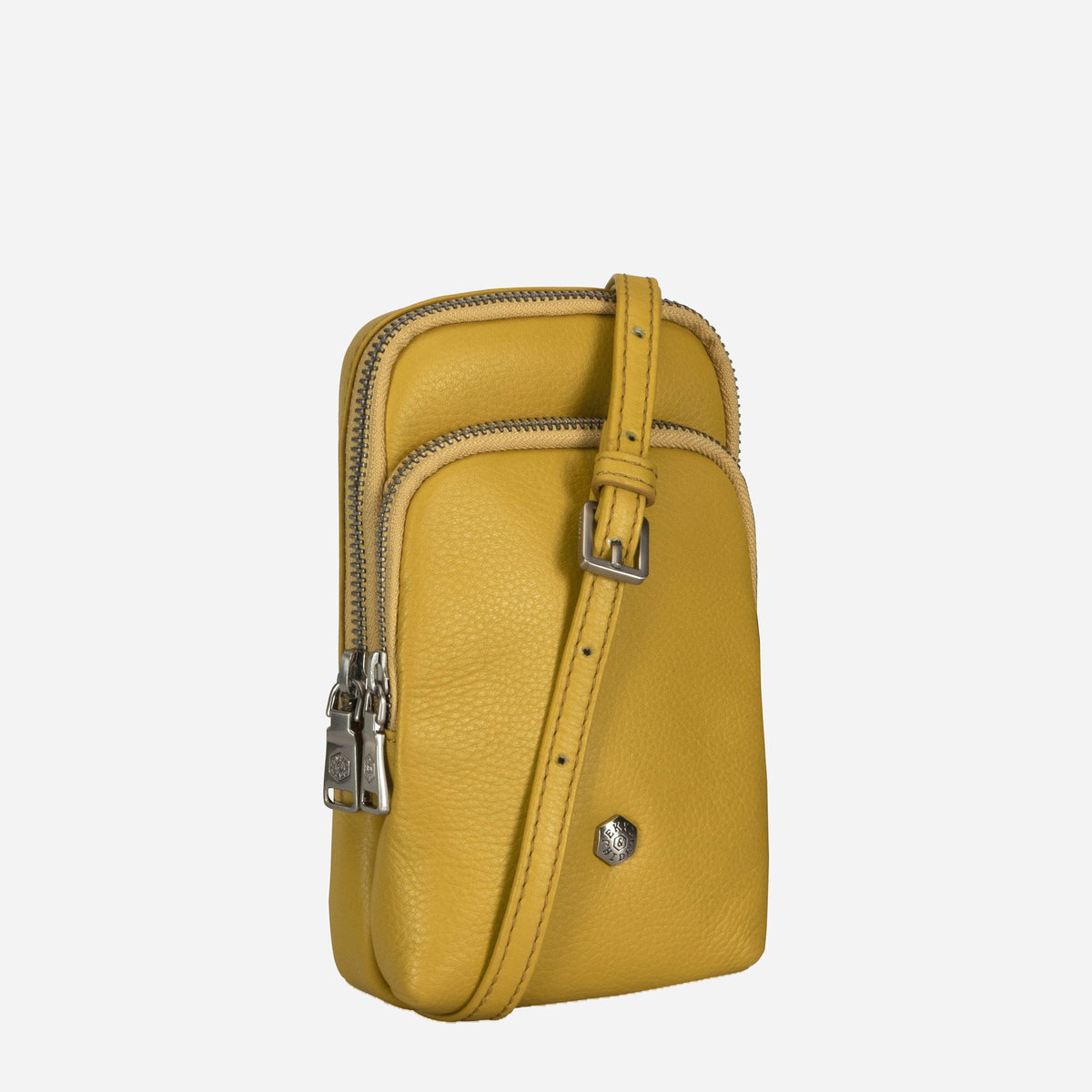 Three-quarter view of the yellow leather Sling Bag with adjustable strap