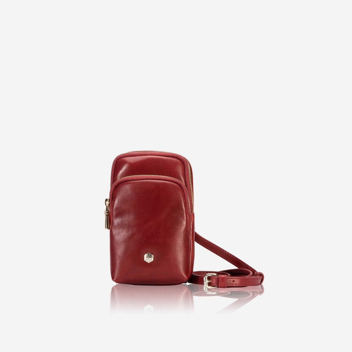 Red leather small crossbody sling bag with adjustable strap, front view – Jekyll & Hide