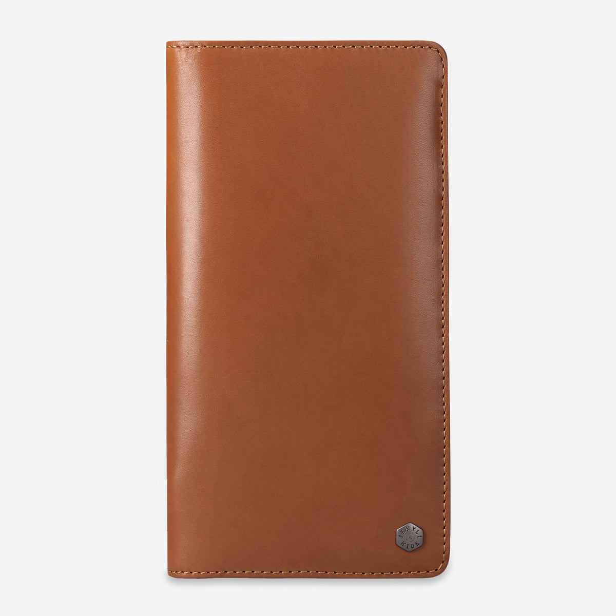 Jekyll & Hide Travel Organiser in tan leather with hexagonal logo, front view