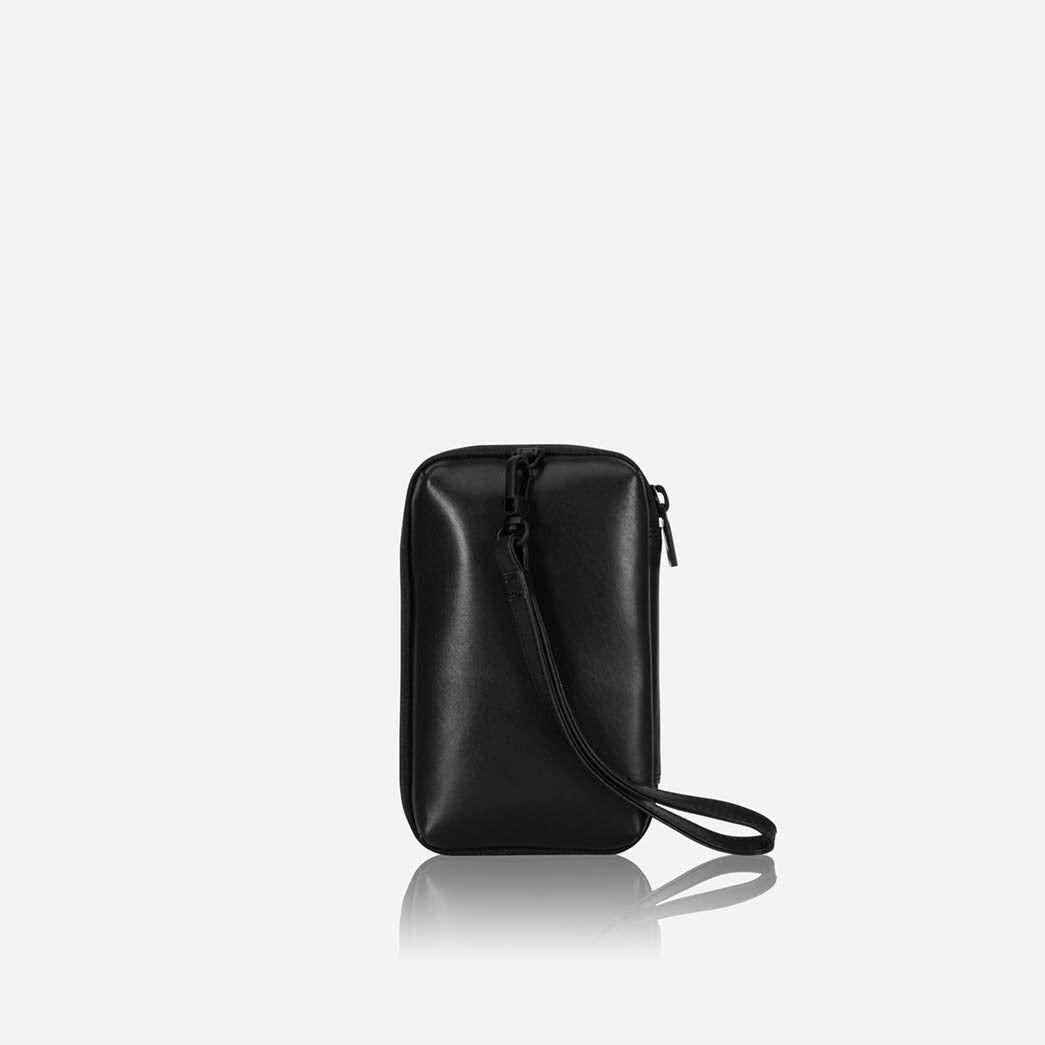 Angled view of the black leather Cable Pouch with wrist strap