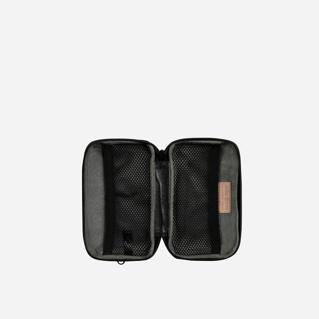Black leather Cable Pouch opened flat, showing grey lining and mesh pockets