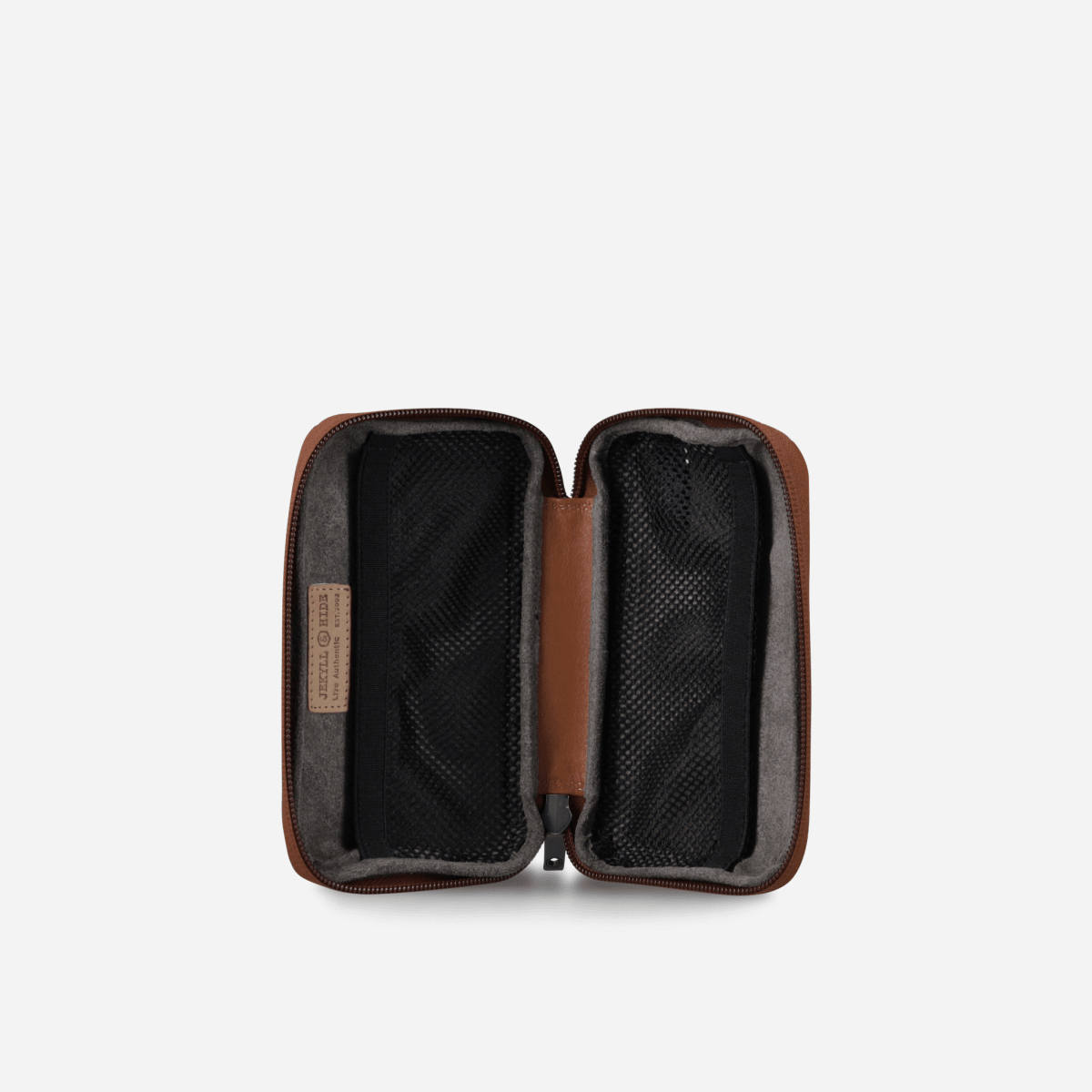 Tan leather Cable Pouch opened flat, showing grey lining and mesh pockets