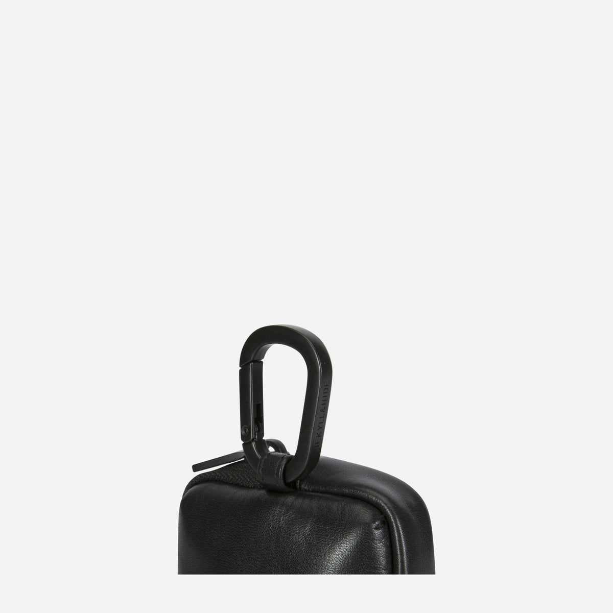 Close-up of the black Men's Utility Pouch metal clip and leather loop