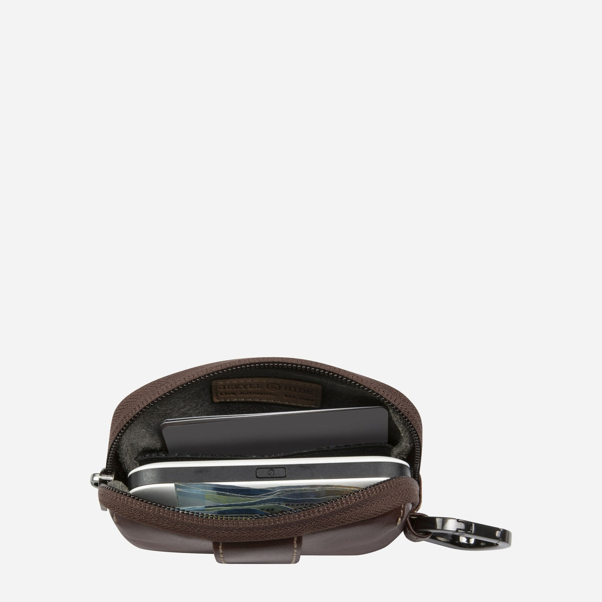 Mocha Men's Utility Pouch unzipped, showing the lined interior with cables and cards