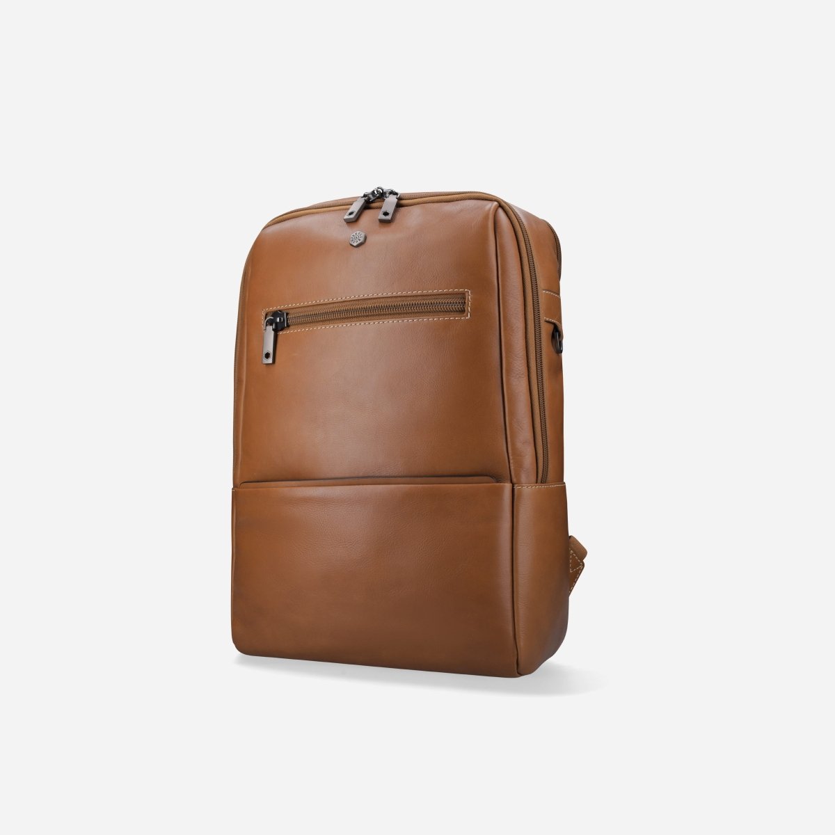 Three-quarter view of the tan leather laptop backpack – Jekyll & Hide