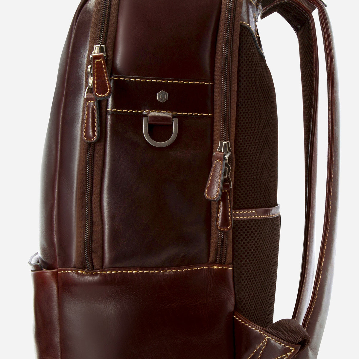 Side view of the Mocha Laptop Backpack showing the side pocket and strap fittings
