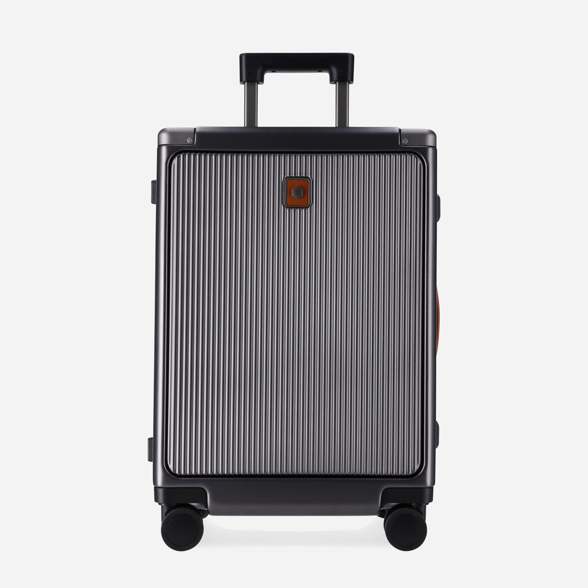 Front of the Colt Carry-on suitcase with extended trolley handle and brand badge