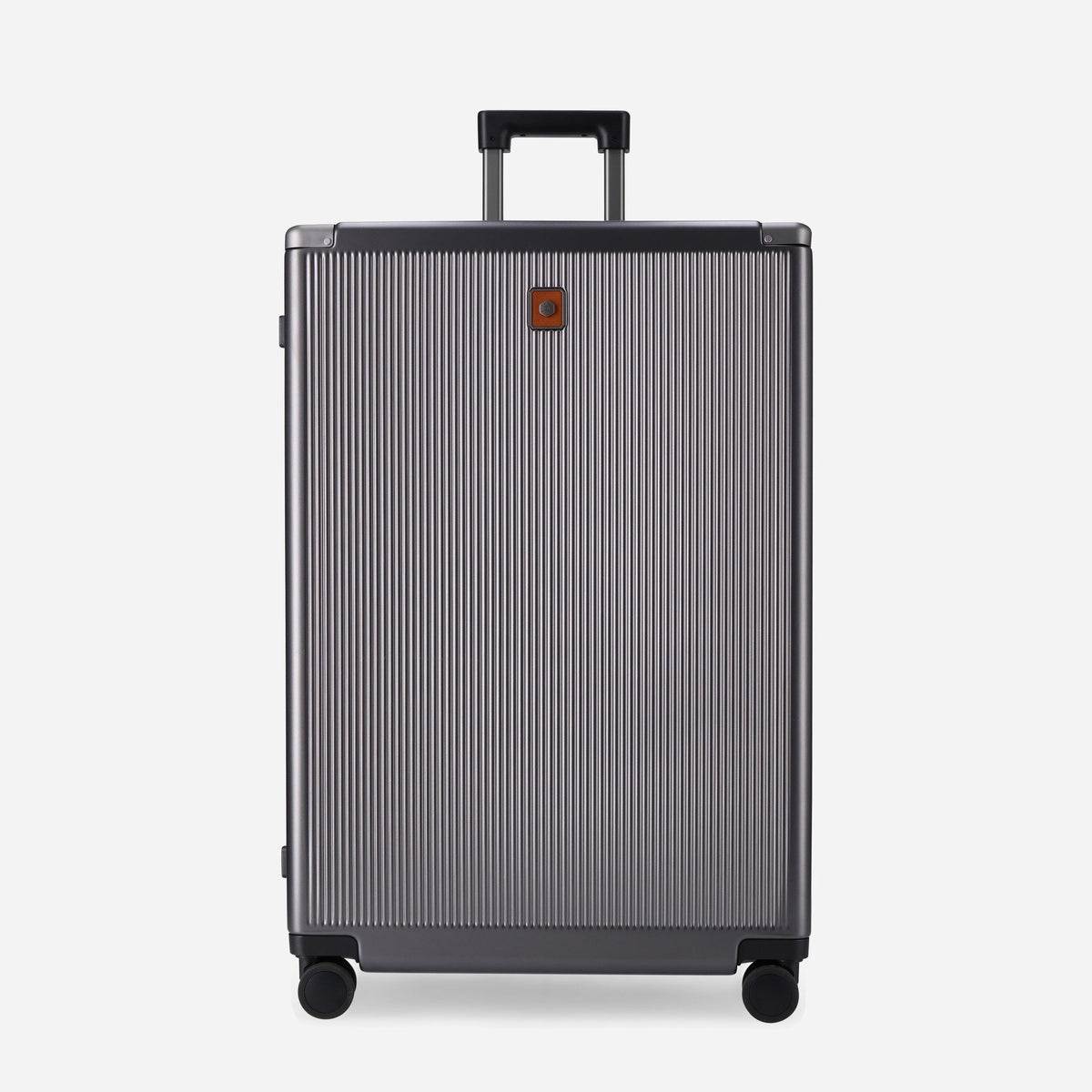 Front of the Colt Large Check-In suitcase with brand badge and trolley handle