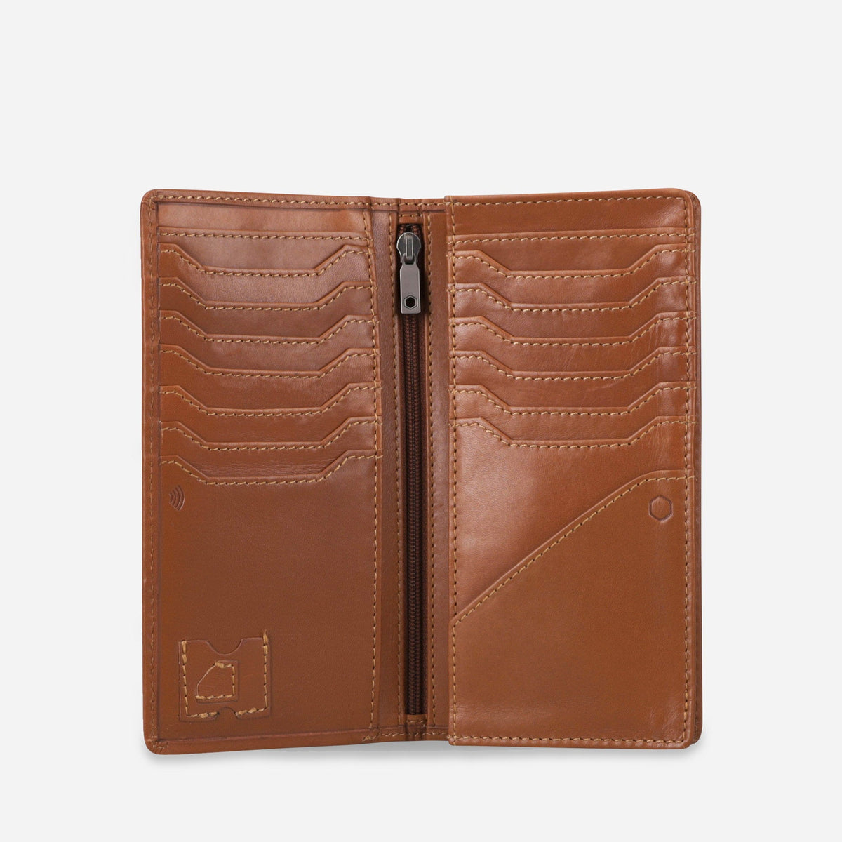 Tan leather Travel Wallet open flat, showing twelve card slots, a central zip pocket and a document sleeve