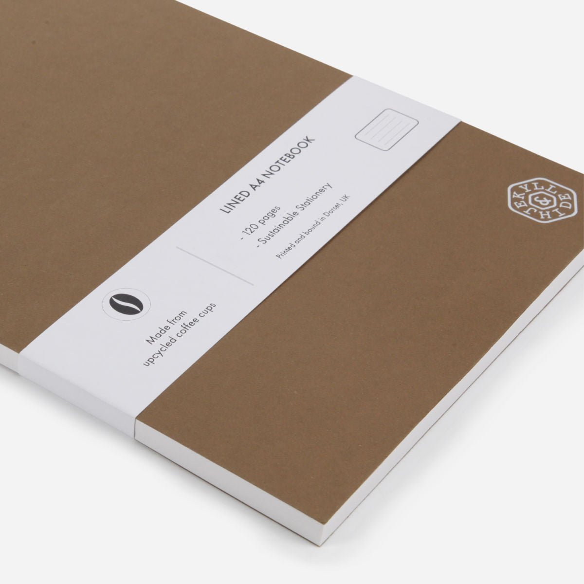 Close-up of the Hazel A4 Notebook belly band and embossed hexagonal Jekyll & Hide logo