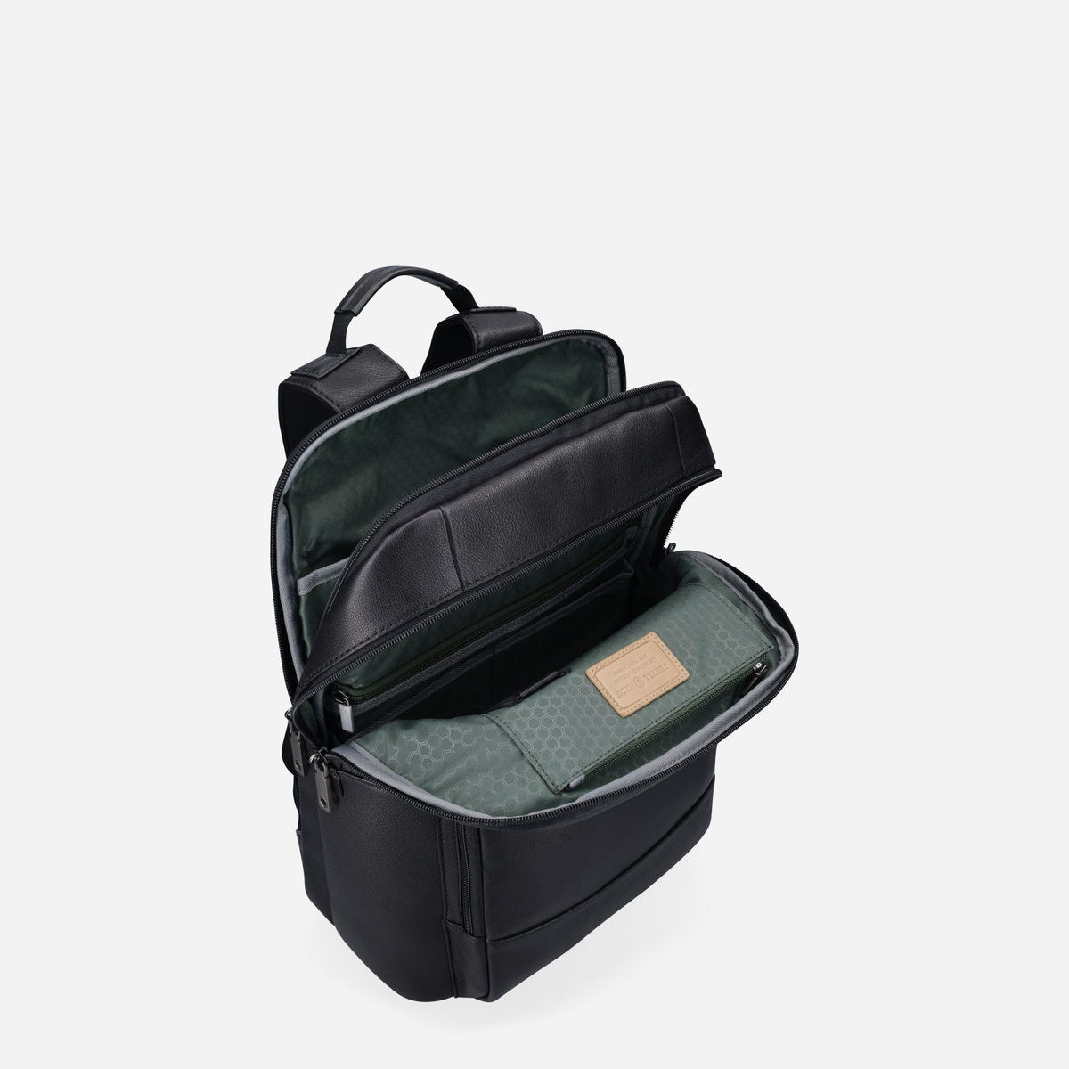 Open top of the black leather backpack showing green lining