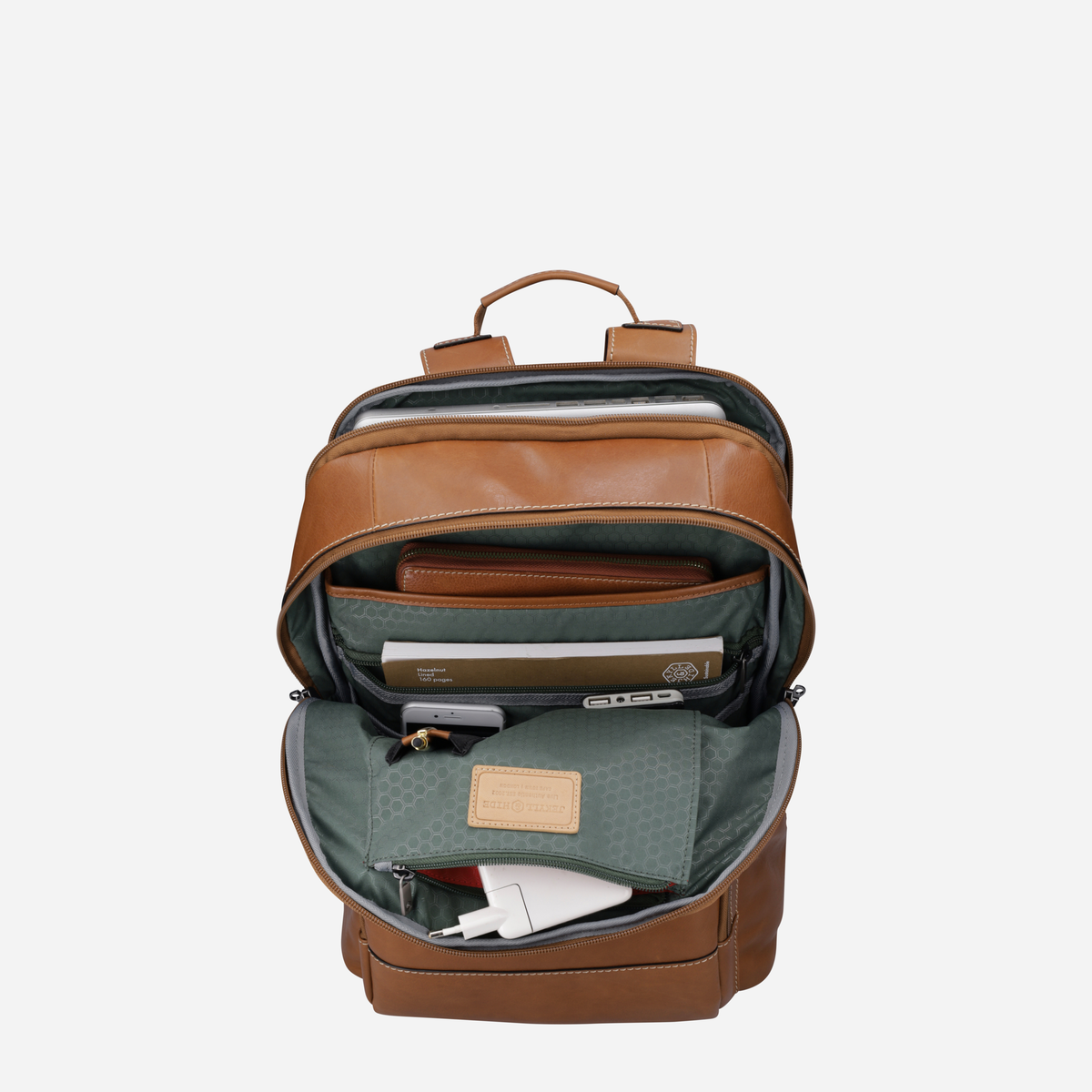 Open tan leather backpack showing green organiser with a laptop