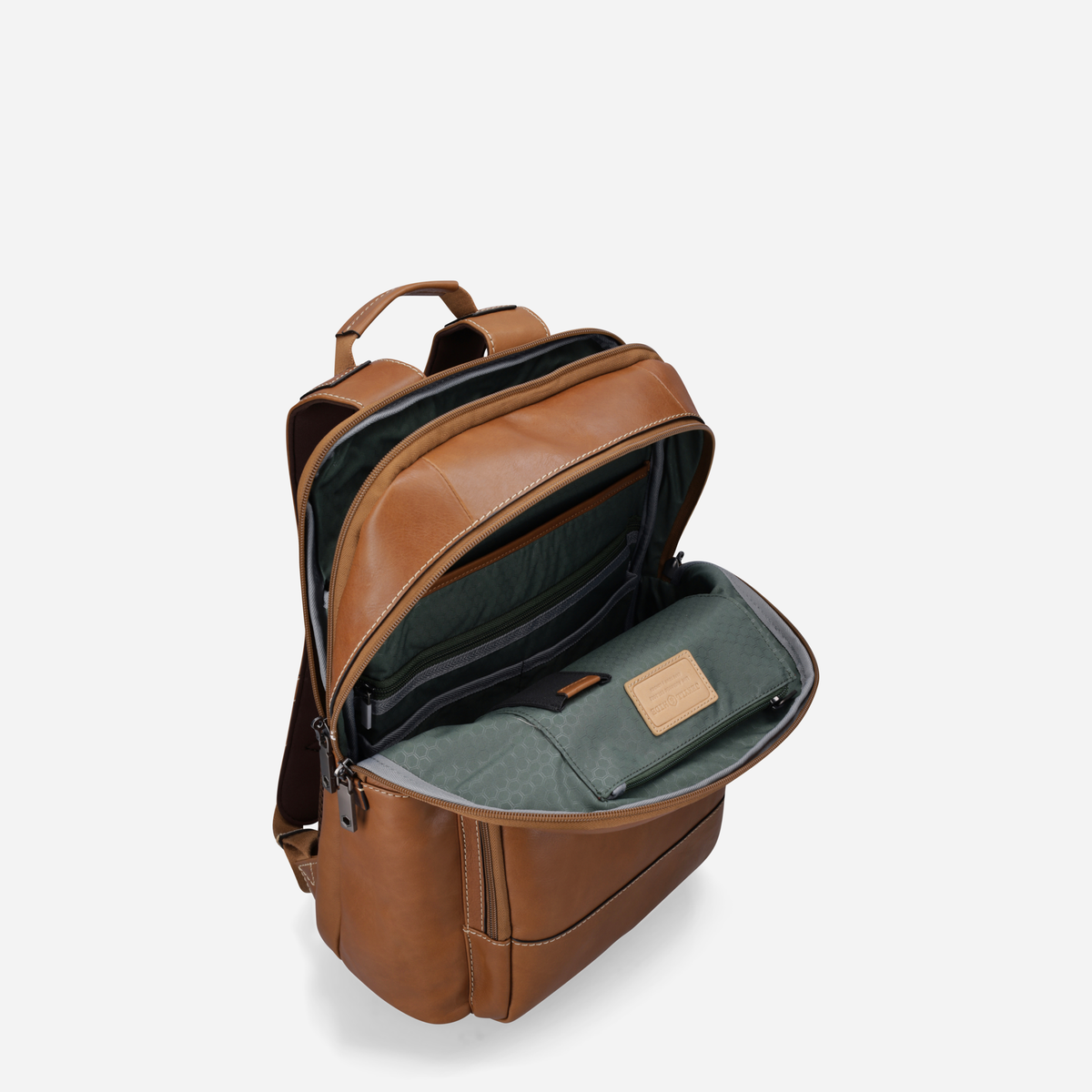 Open top of the tan leather backpack showing green lining