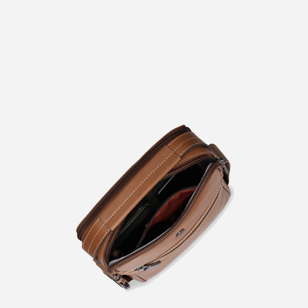 Colt leather Crossbody Organiser unzipped from above, showing the dark lined interior
