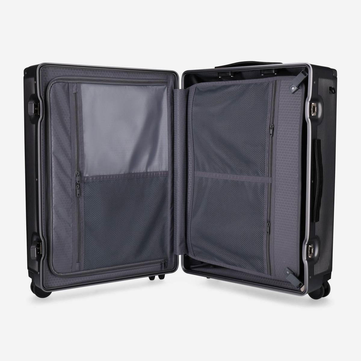 Open Jekyll & Hide graphite-black hardshell Medium Check-In suitcase showing grey-lined compartments