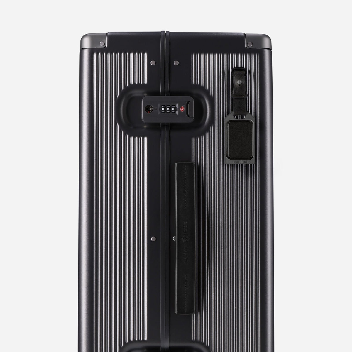 Rear of the Jekyll & Hide graphite-black Medium Check-In suitcase with TSA locks and black luggage tag